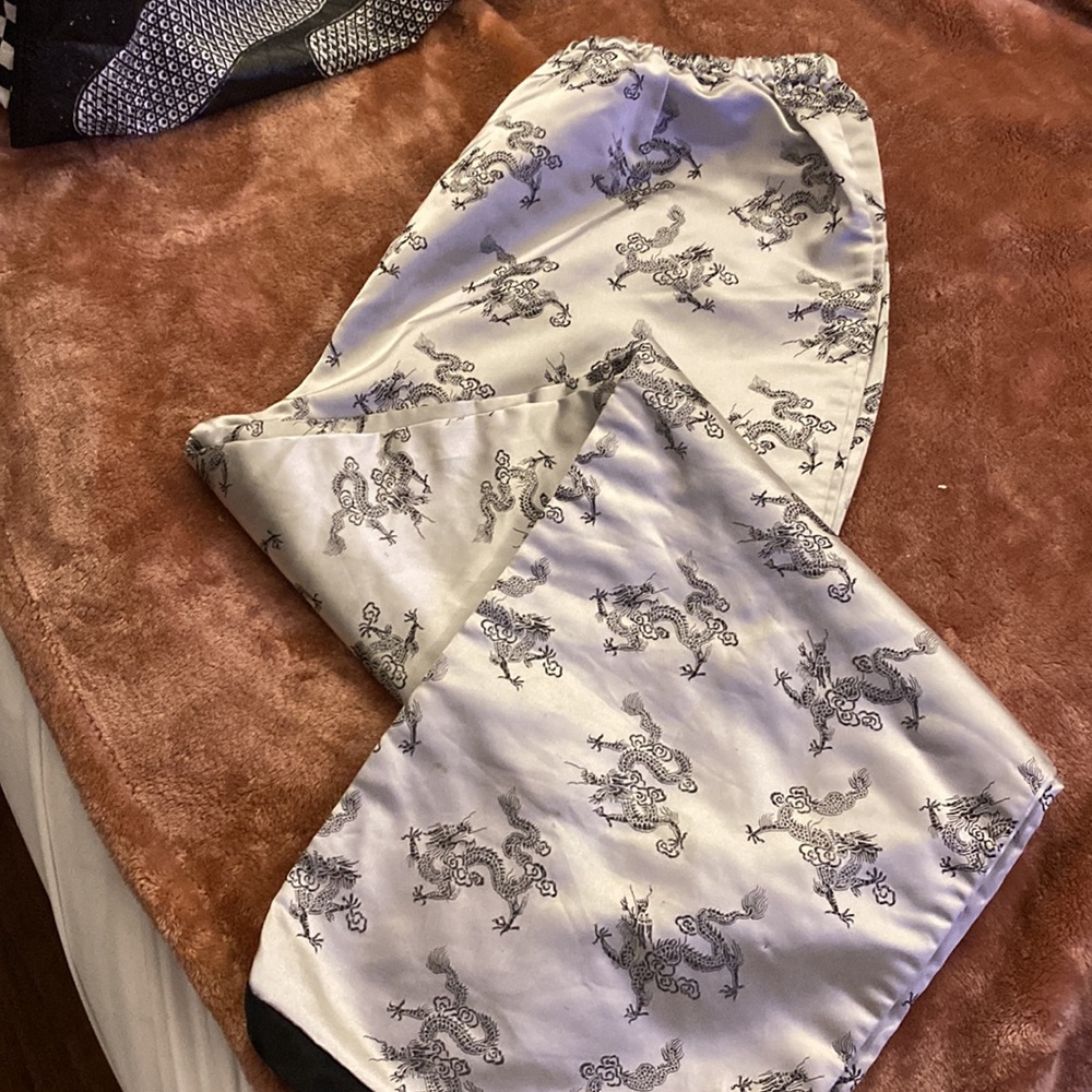 Silver baggy dragon design pants